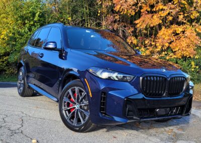 A car with a shiny, clean exterior after being detailed.