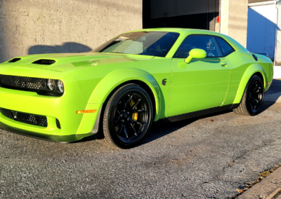 A car getting detailed at Total Detailing Auto Spa.